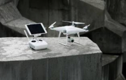 (NEED GONE) DJI Phantom 4 Drone – Damaged, With Extras (Batteries, Remote, Chargers Image
